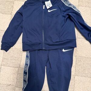 Nike Navy Blue Kids Sweatpants with White Swoosh & Branded Side Tape